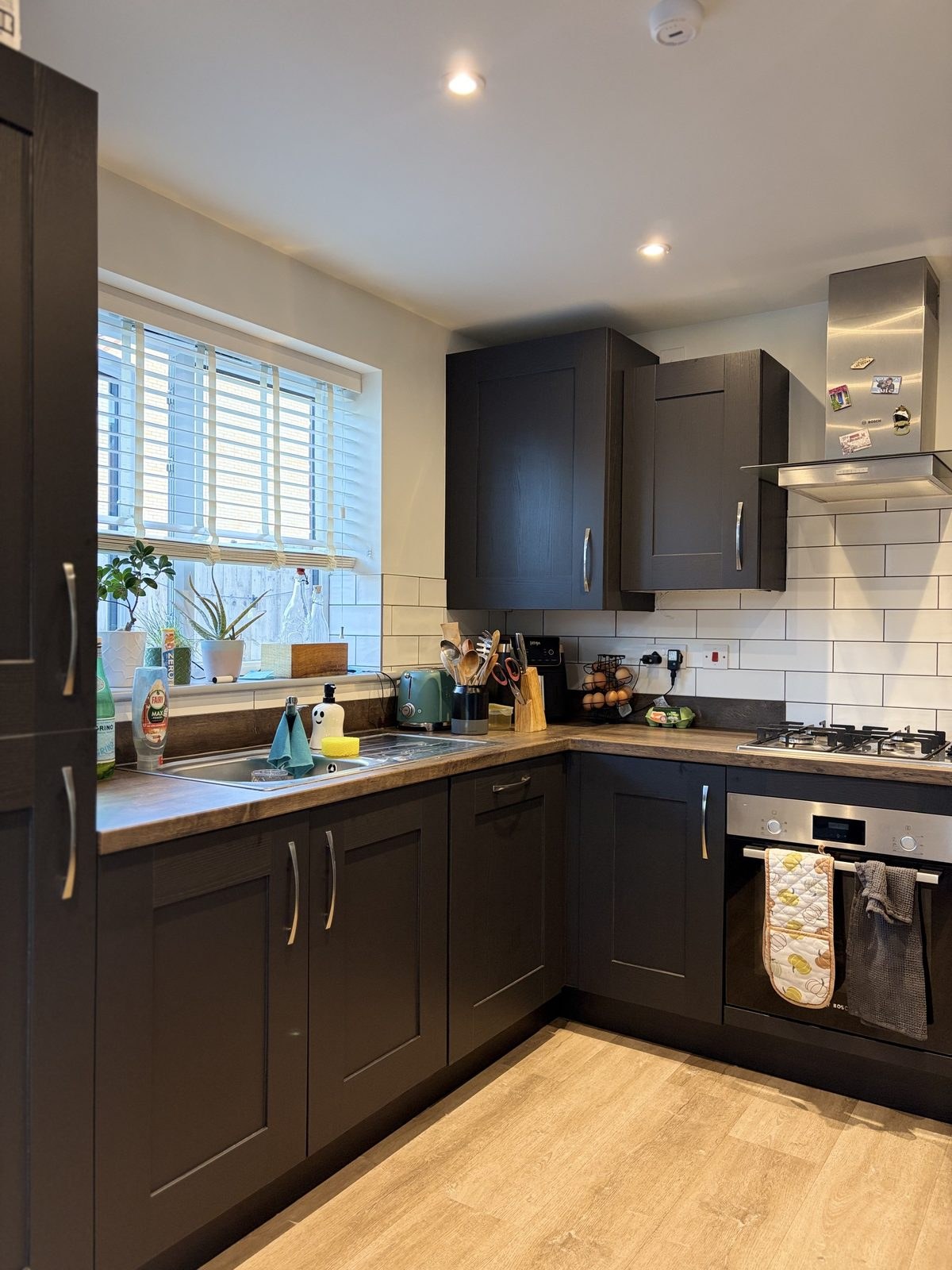Black wood effect kitchen wrap · Cambridge