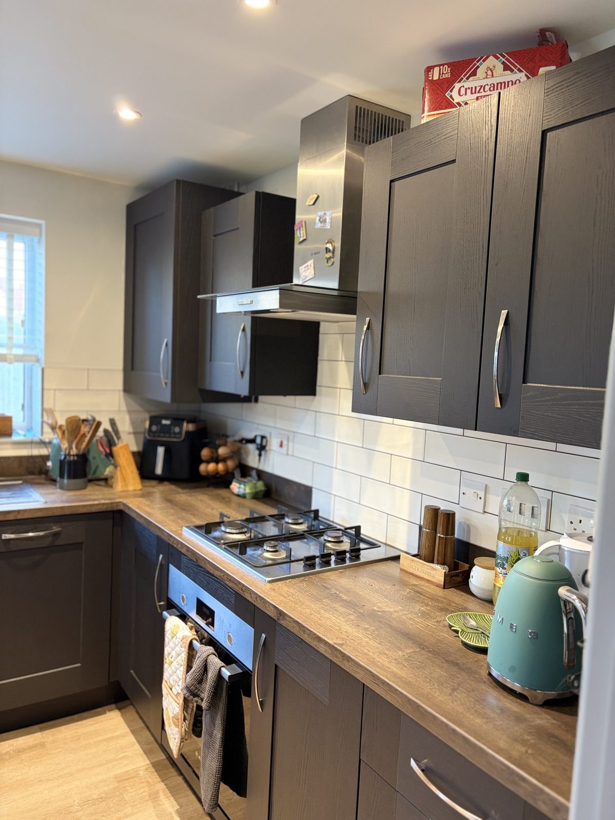 Black wood effect kitchen wrap · Cambridge