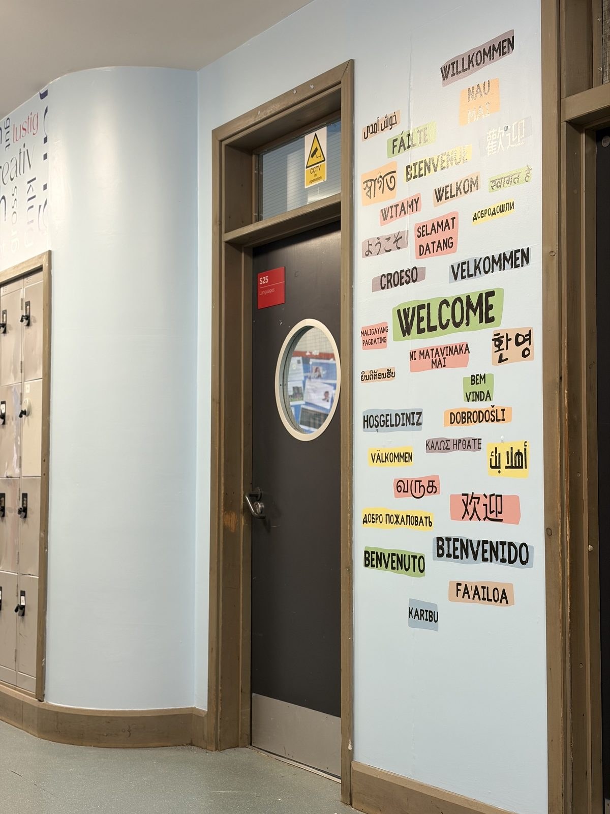 Custom wall graphic in school corridor · Cambridge