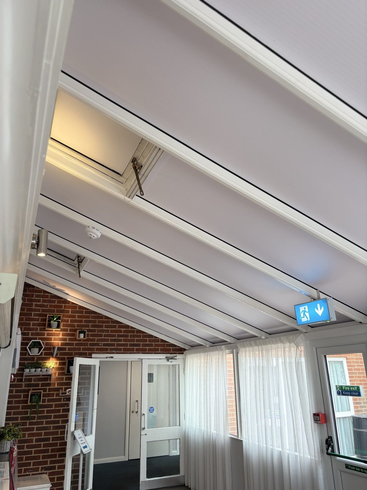 Decorative window film in hotel · Cambridge