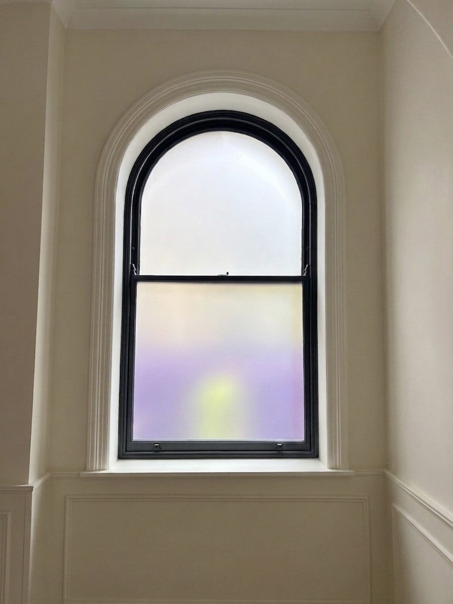 Frosted window film in hotel · Cambridge